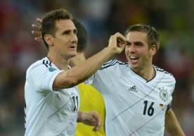 German forward Miroslav Klose (L) gestur