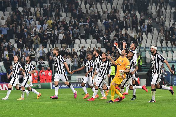 Juventus players celebrate at the end of the UEFA Champions League semi-final first leg football match Juventus vs Real Madrid on May 5, 2015 at the Juventus stadium in Turin. Juventus won 2-1.        AFP PHOTO / GIUSEPPE CACACE        (Photo credit should read GIUSEPPE CACACE/AFP/Getty Images)