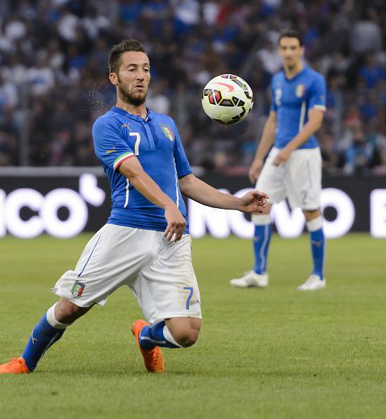 Italy's midfielder Andrea Bertolacci controls the ball during the friendly game Portugal against Italy on the Stade de Geneve on June 16, 2015 in Geneva.  AFP PHOTO / FABRICE COFFRINI        (Photo credit should read FABRICE COFFRINI/AFP/Getty Images)