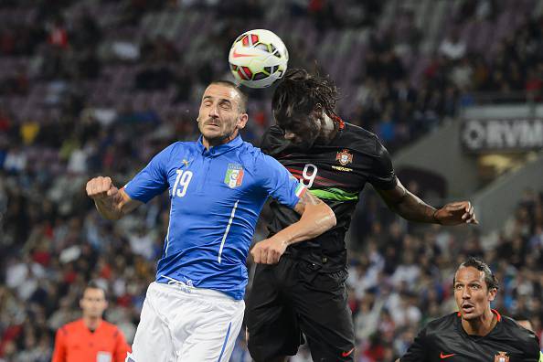 Italy's defender Leonardo Bonucci (L) heads the ball next to Portugal's forward Eder during the friendly game Portugal against Italy at the Stade de Geneve on June 16, 2015 in Geneva.  AFP PHOTO / FABRICE COFFRINI        (Photo credit should read FABRICE COFFRINI/AFP/Getty Images)