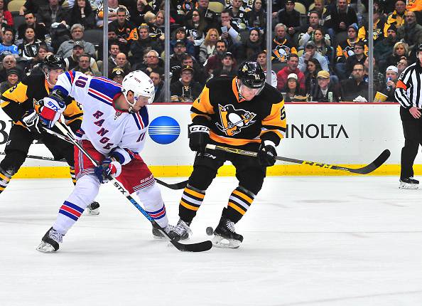 J.T. Miller #10 of the New York Rangers skates with the puck during a game against the Pittsburgh Penguins at Consol Energy Center on February 10, 2016 in Pittsburgh, Pennsylvania. (Photo by Matt Kincaid/Getty Images)