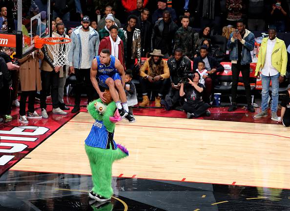TORONTO, ON - FEBRUARY 13: Aaron Gordon of the Orlando Magic dunks over Stuff the Orlando Magic mascot in the Verizon Slam Dunk Contest during NBA All-Star Weekend 2016 at Air Canada Centre on February 13, 2016 in Toronto, Canada. NOTE TO USER: User expressly acknowledges and agrees that, by downloading and/or using this Photograph, user is consenting to the terms and conditions of the Getty Images License Agreement. (Photo by Vaughn Ridley/Getty Images)