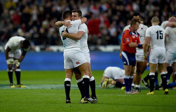 England's scrum-half Ben Youngs (L) and England's fly-half George Ford (R) hug as they celebrate after winning the Six Nations international rugby union match between France and England at the Stade de France in Saint-Denis, north of Paris, on March 19, 2016. AFP PHOTO / FRANCK FIFE / AFP / FRANCK FIFE        (Photo credit should read FRANCK FIFE/AFP/Getty Images)