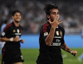 AC Milan's Alberto Aquilani (R) celebrat