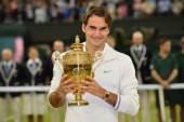 Switzerland's Roger Federer celebrates w
